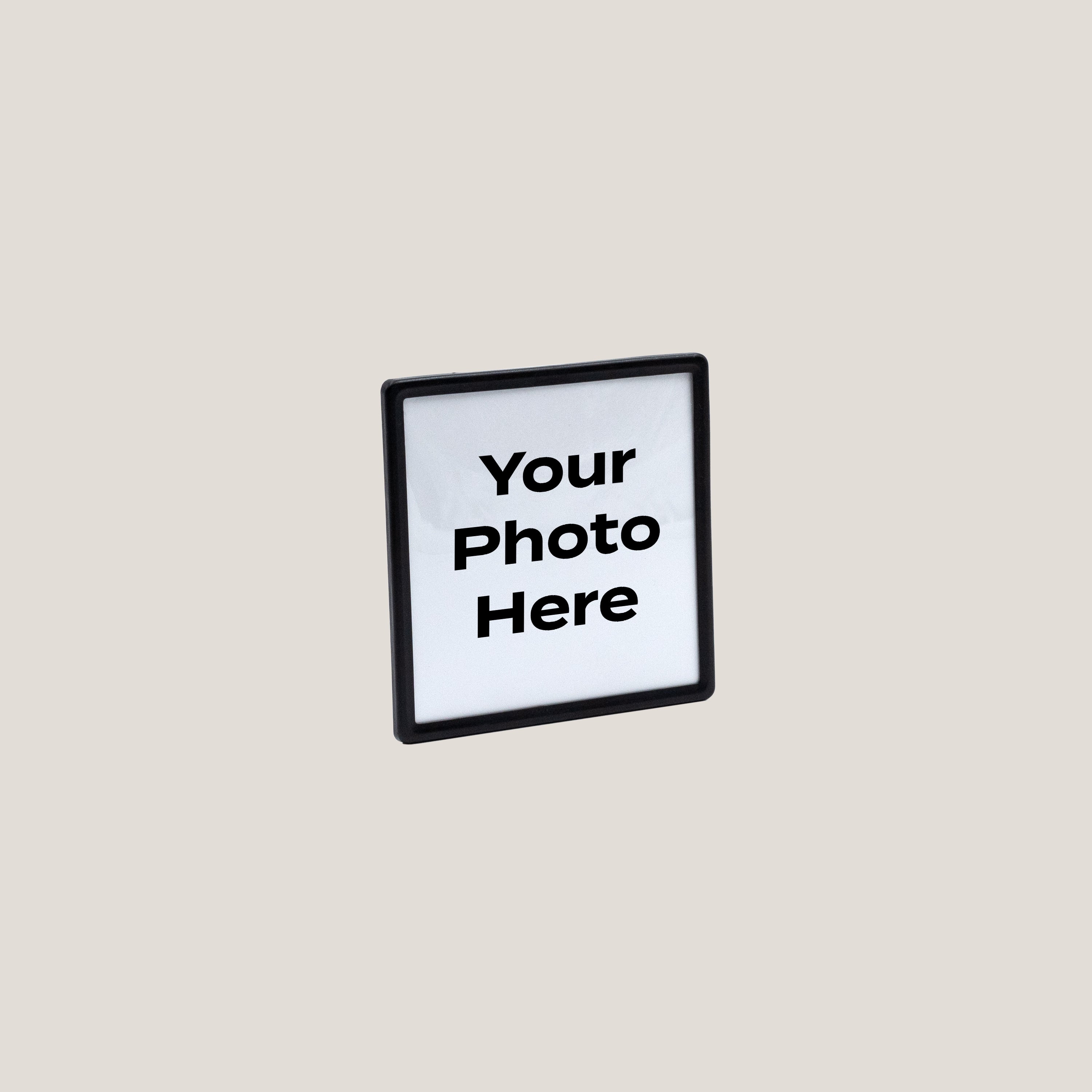 Customizable Black Frame Magnetic Photo Frame with acrylic front and placeholder text your photo here for displaying pictures on fridge locker or office surfaces