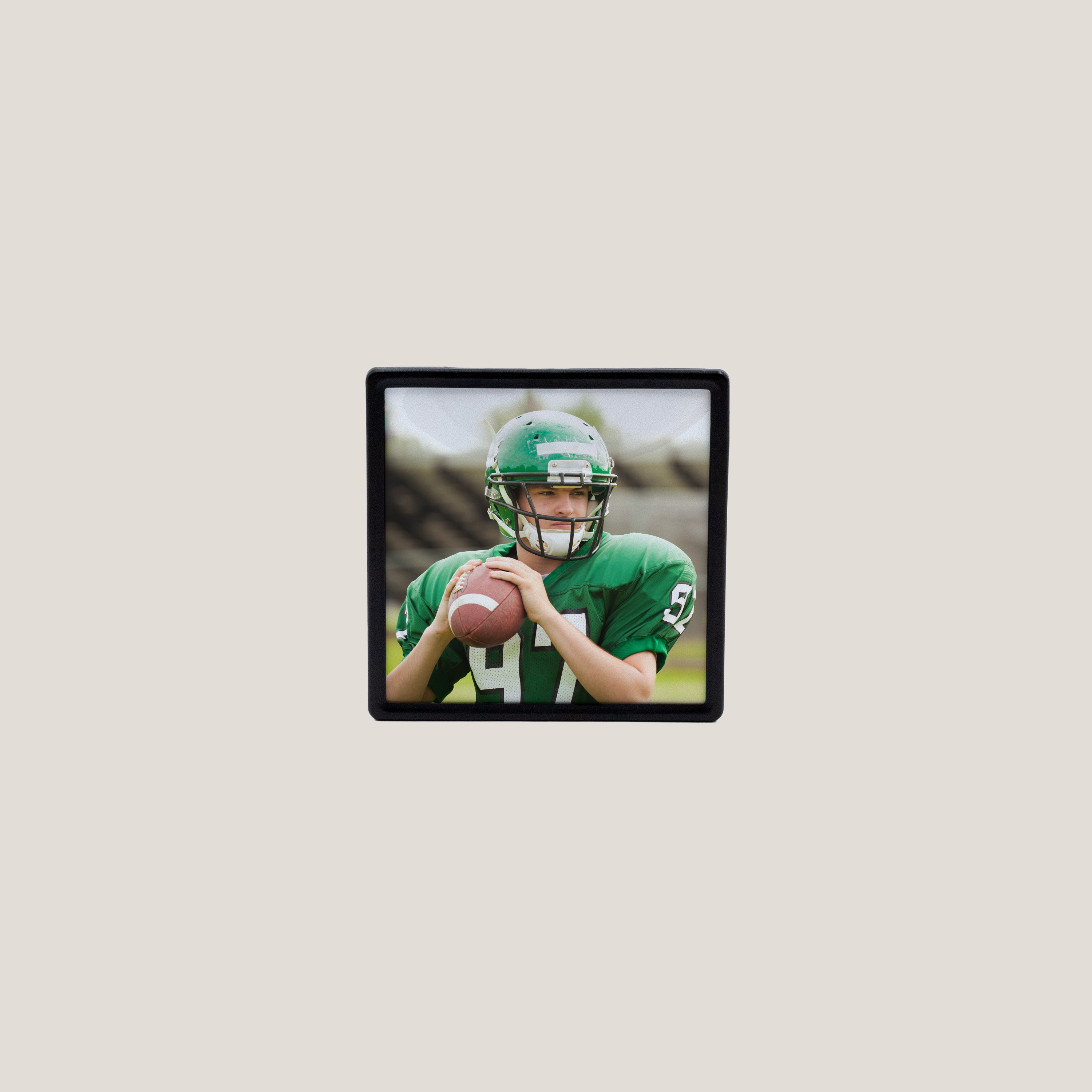 Close up of Black Frame Photo Magnet with glossy acrylic front protecting photo